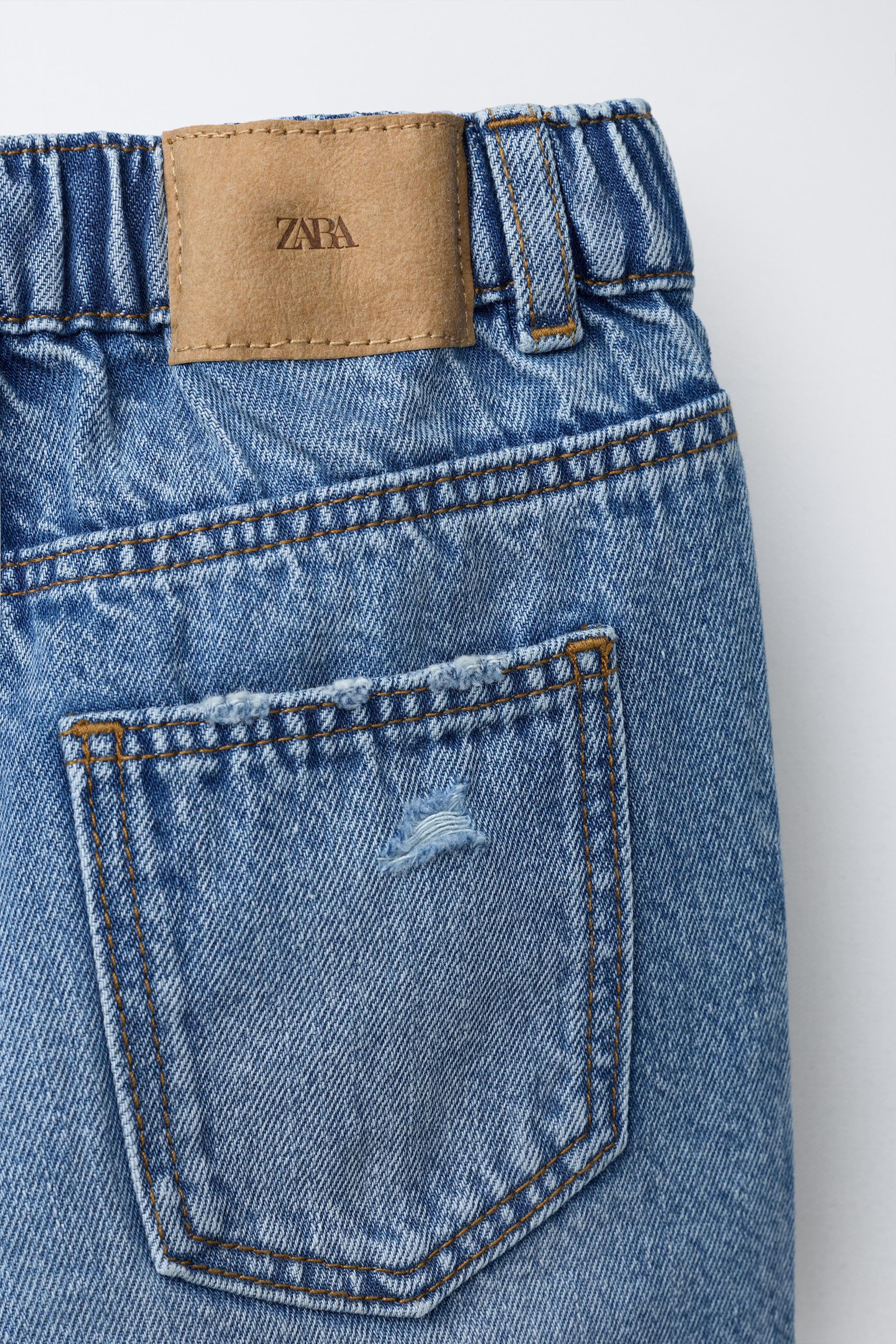 BERMUDA EN JEAN BAGGY DÉCHIRÉ